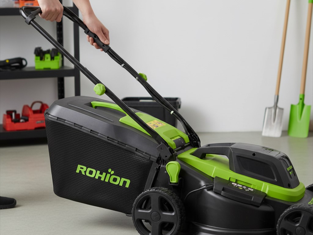 Lightweight electric lawn mower with foldable handle for easy storage and low maintenance.